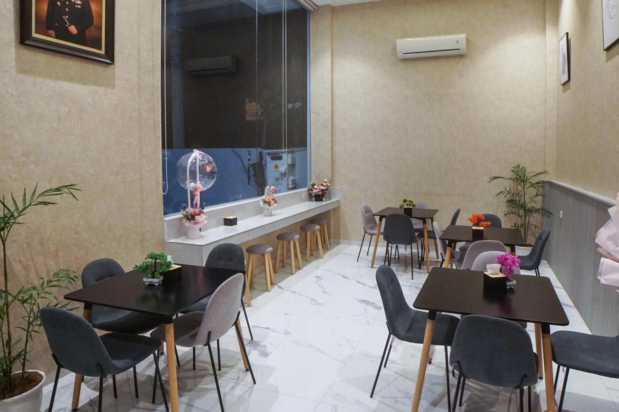 Super Oyo Capital O 92066 Papakoel Hotel & Cafe 棉兰 外观 照片