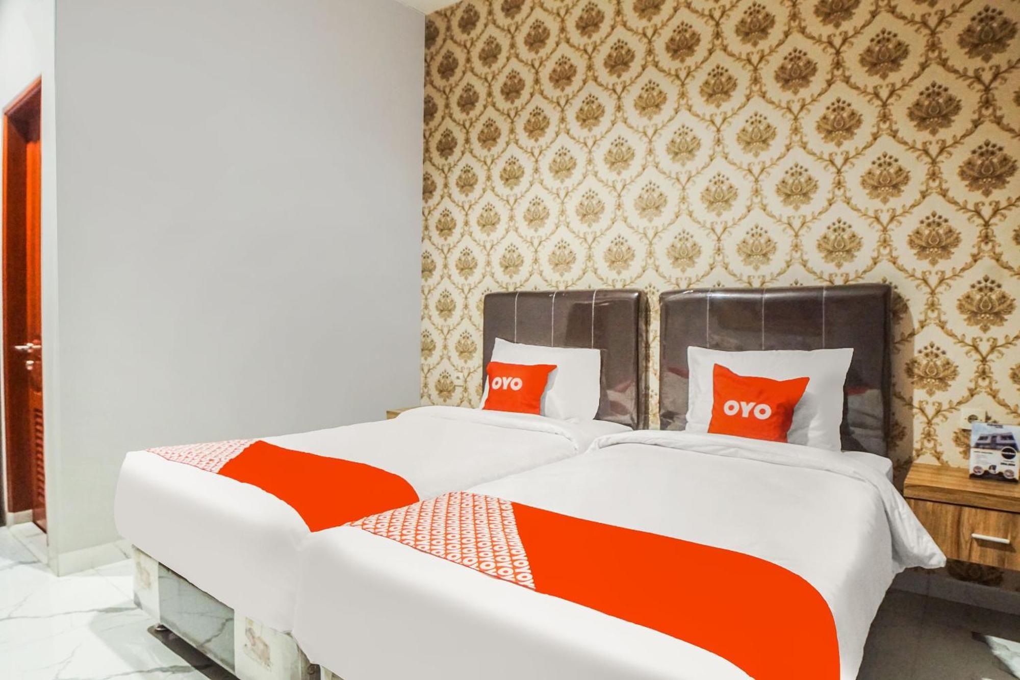 Super Oyo Capital O 92066 Papakoel Hotel & Cafe 棉兰 外观 照片